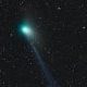 Comet c/2022/E3 bilde av grønn komet i verdensrommet